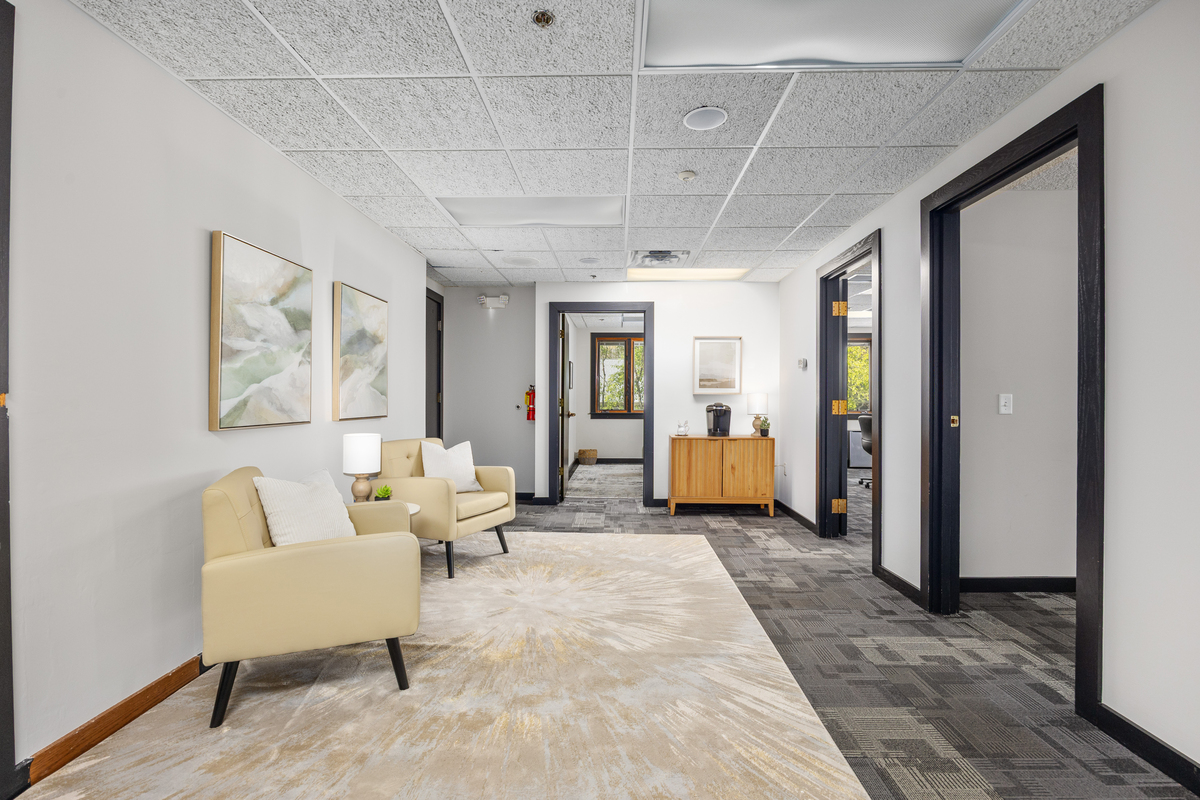 Waiting area with soft chairs and natural light